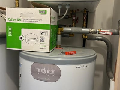 Cylinder pipework left unlagged — Hot press
