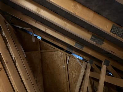Roofing felt torn between the rafters — Roof space