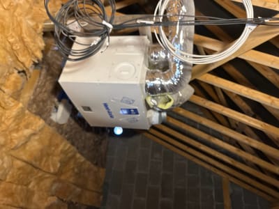 Ventilation unit left unsecured — Attic